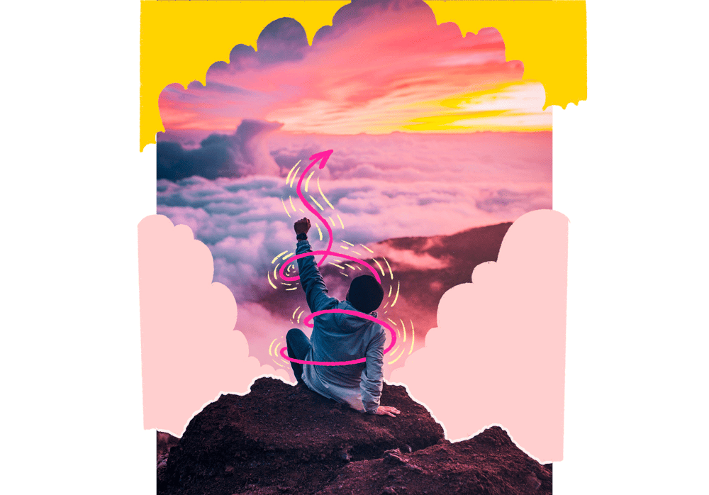A boy sits atop a mountain, punching the sky because he has found success